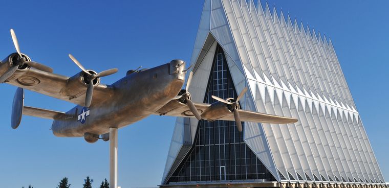 shutterstock ID: 17681932  United States Air Force Academy Chapel with aircraft sculpture in the foreground J By John Hoffman