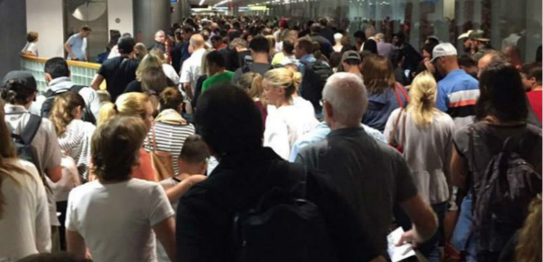 Long lines at Miami International Airport during a TECS outage in 2017