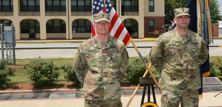 First Lts. Timothy Hennessy, left, and James Gusman during the Cyber Direct Commissioning Ceremony May 9, 2018, at Fort Benning, Georgia.