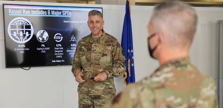 Lt. Gen. Timothy Haugh receives a brief about Kessel Run’s various applications and platforms at a Kessel Run facility on Hanscom Air Force Base, Mass., May 13, 2021 Photo by Richard Blumenstein