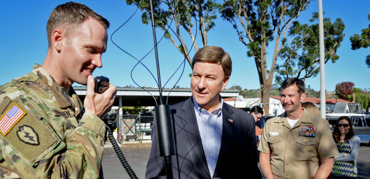Rep. Mike Rogers (center) visits Space and Naval Warfare Systems Center Pacific in 2016 (Photo credit: Alan Antczak/ Naval Information Warfare Center Pacific) 