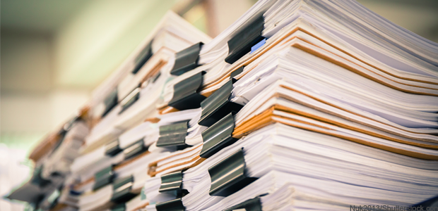 piles of documents (Nuk2013/Shutterstock.com)