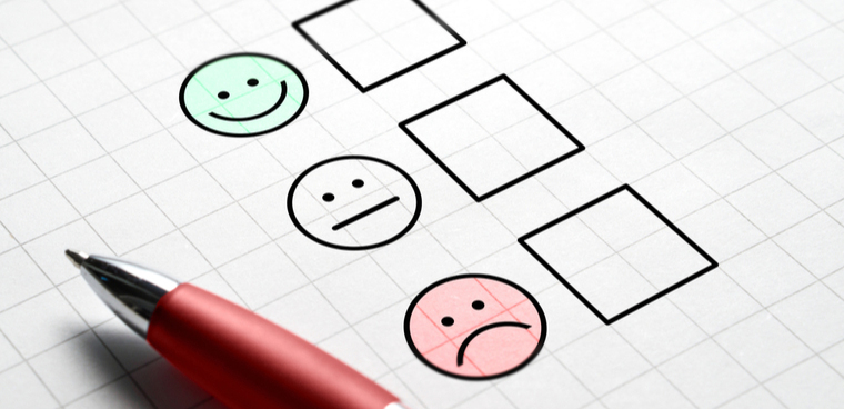 happy, sad, indifferent faces with checkbox (shutterstock)