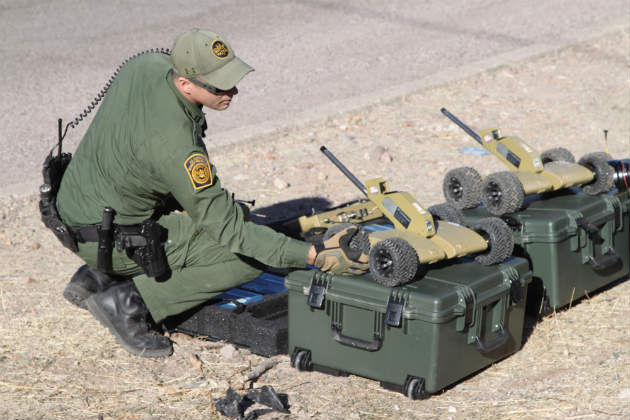 Border Patrol agent prepares to deploy a Pointman robot to explore a tunnel along the U.S.-Mexican border.