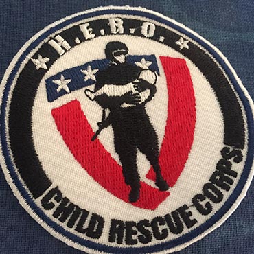 The Human Exploitation Rescue Operative Corps' (HERO Corps) logo. 