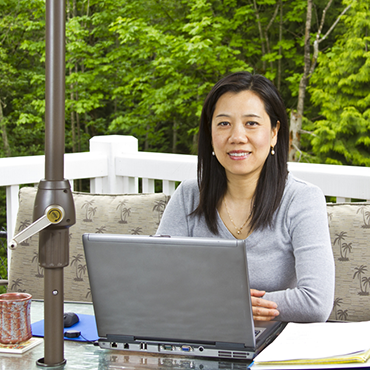 woman teleworking outdoors
