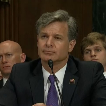 Christopher Wray, President Trump's nominee to lead the FBI, takes questions from senators at his July 12 confirmation hearing.