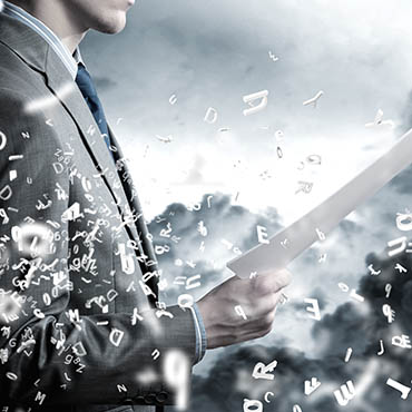 Shutterstock image: businessman weathering a data storm.