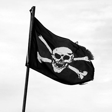 Shutterstock image (by Sarah Marchant): Jolly Roger, pirate flag.