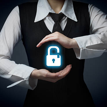 Shutterstock image (by Den Rise): Security services and protection concept; businesswoman displays a padlock, symbol of security.