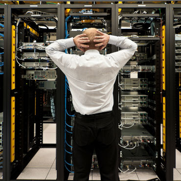 astonished man in data center