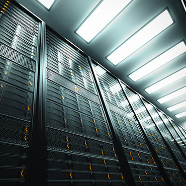 Shutterstock image: data center lights and hardware.