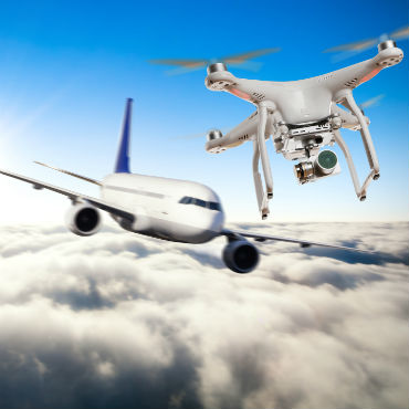 By Jag_cz Stock photo ID: 407468995 Drone flying near commercial airplane
