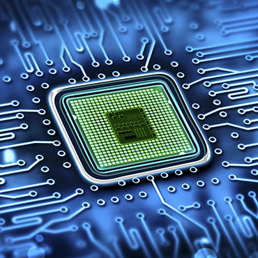 Shutterstock image (by Robert Lucian Crusitu): microchip integrated on a motherboard.