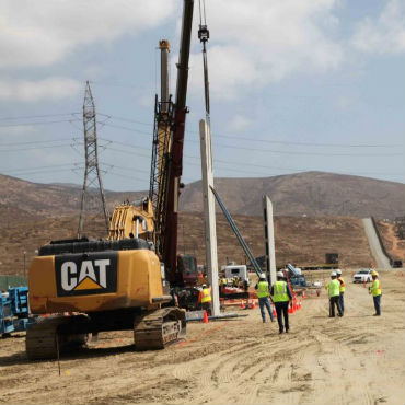 A section of border wall goes up in San Diego