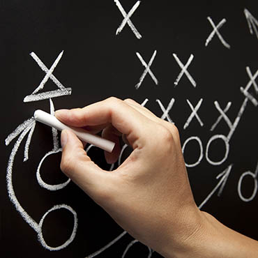 Shutterstock image (Ivelin Radkov): chalkboard game strategy. 