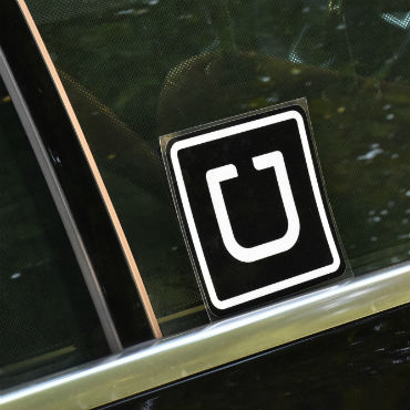 Uber logo on car window