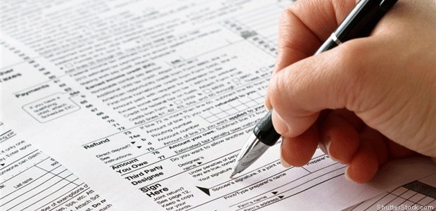 Person signing tax forms